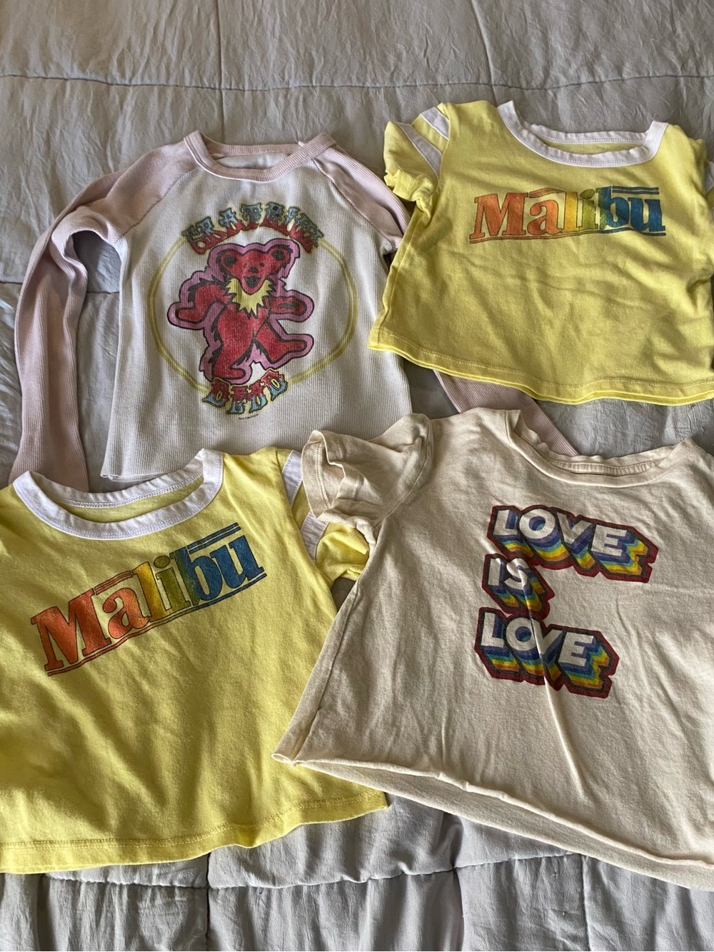 4 Rowdy Sprout Kids Graphic Tees in Yellow, Cream & Pink